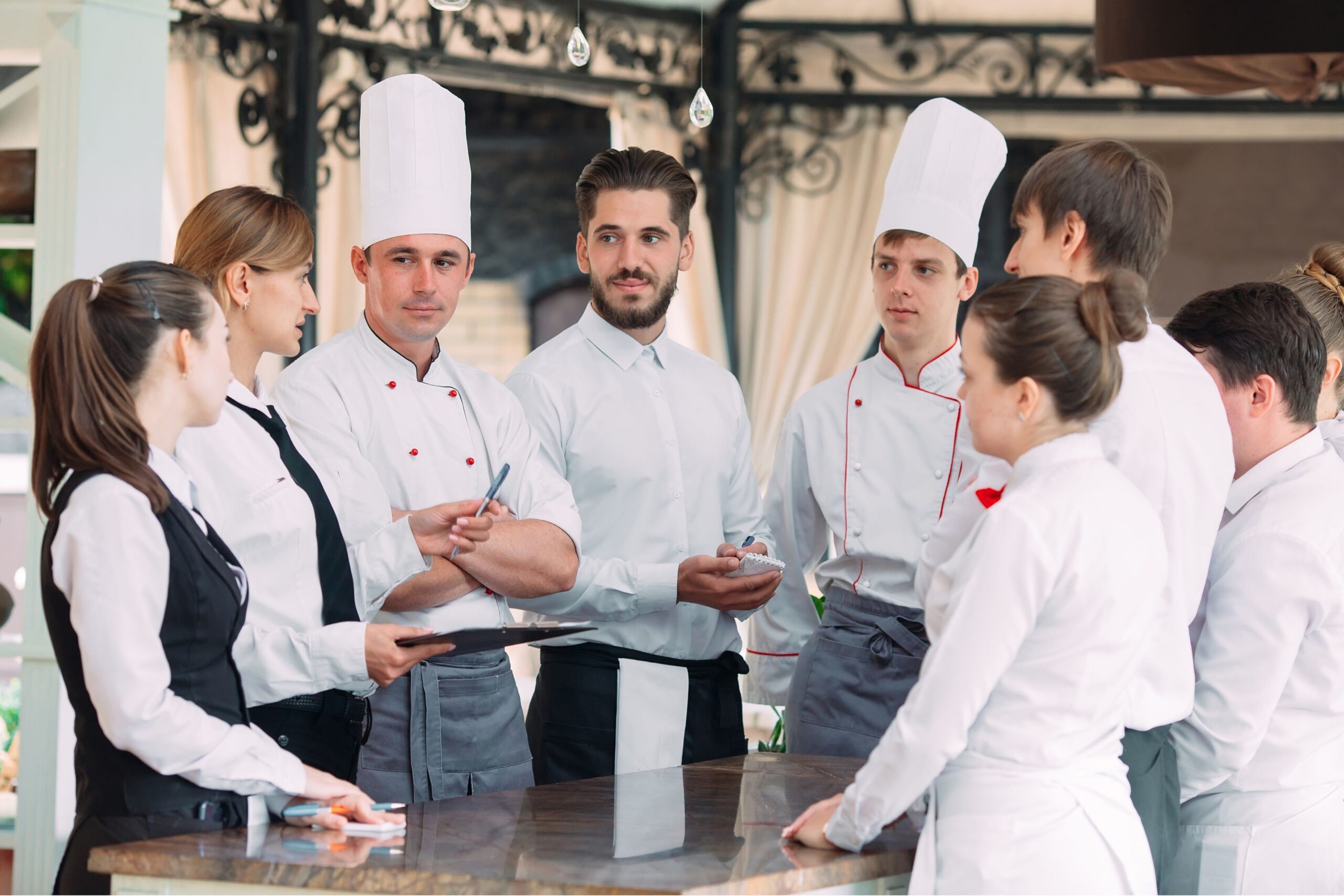Staff Productivity restaurant staff listen to chef