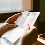 Restaurant owner checking energy relief eligibility on a bill